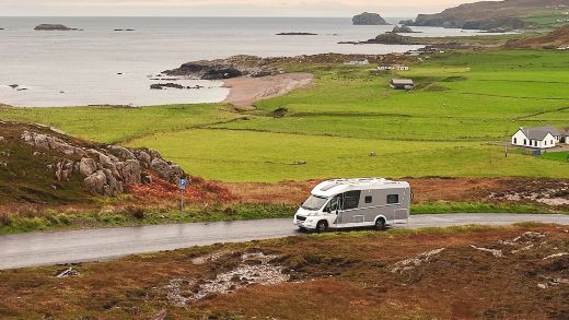 Motorhome driving through the countryside, inspiring road trip travel