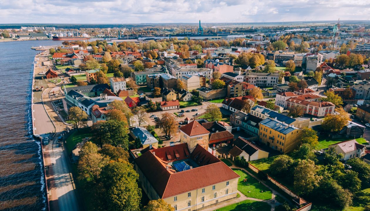 Aerial drone view of the Livonian Order Castle in Ventspils on the Venta River, Livonian Coast, Latvia, Baltic States, Europe