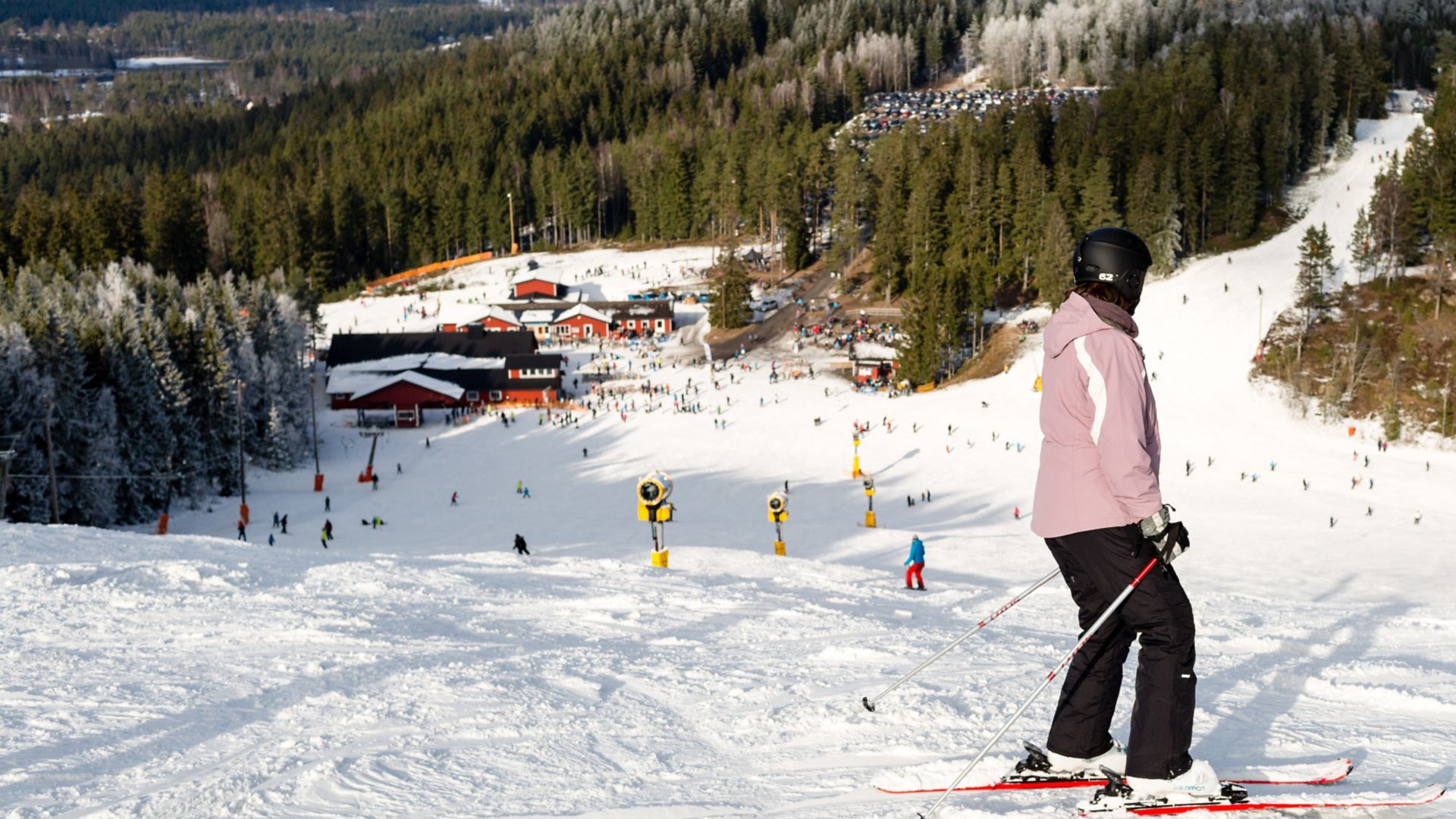 ISABERG, SWEDEN - FEBRUARY 17, 2016: The small ski resort Isaberg in Sweden welcomes skiers on a sunny day during the main skiing season in February.