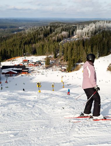 ISABERG, SWEDEN - FEBRUARY 17, 2016: The small ski resort Isaberg in Sweden welcomes skiers on a sunny day during the main skiing season in February.