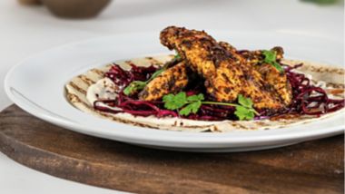 Spiced chicken flatbread with red cabbage and herbs