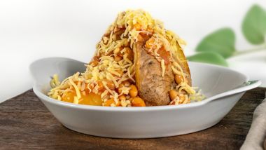 Jacket potato with baked beans and melted cheese