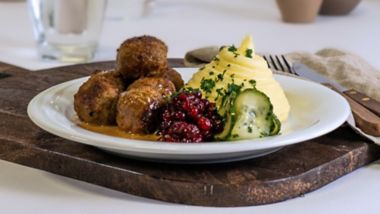 Swedish meatballs with mashed potato, lingonberries and cucumber