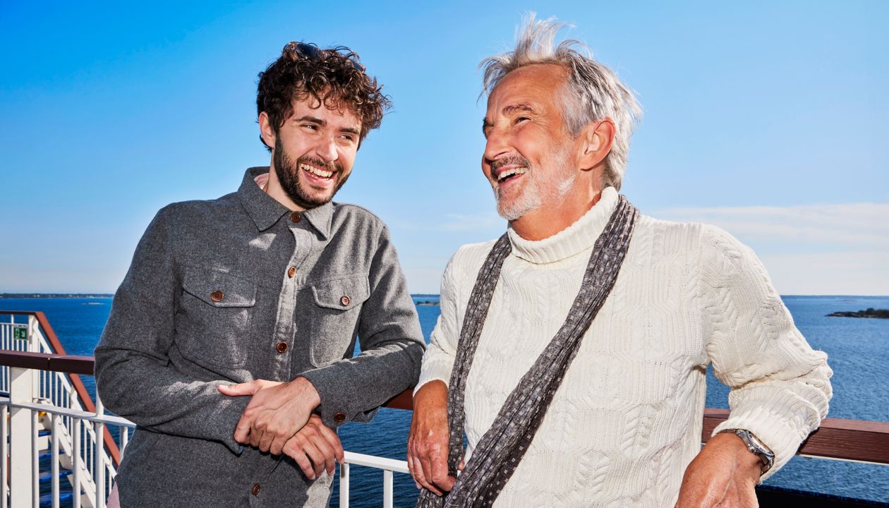 Friends on deck onboard a ferry