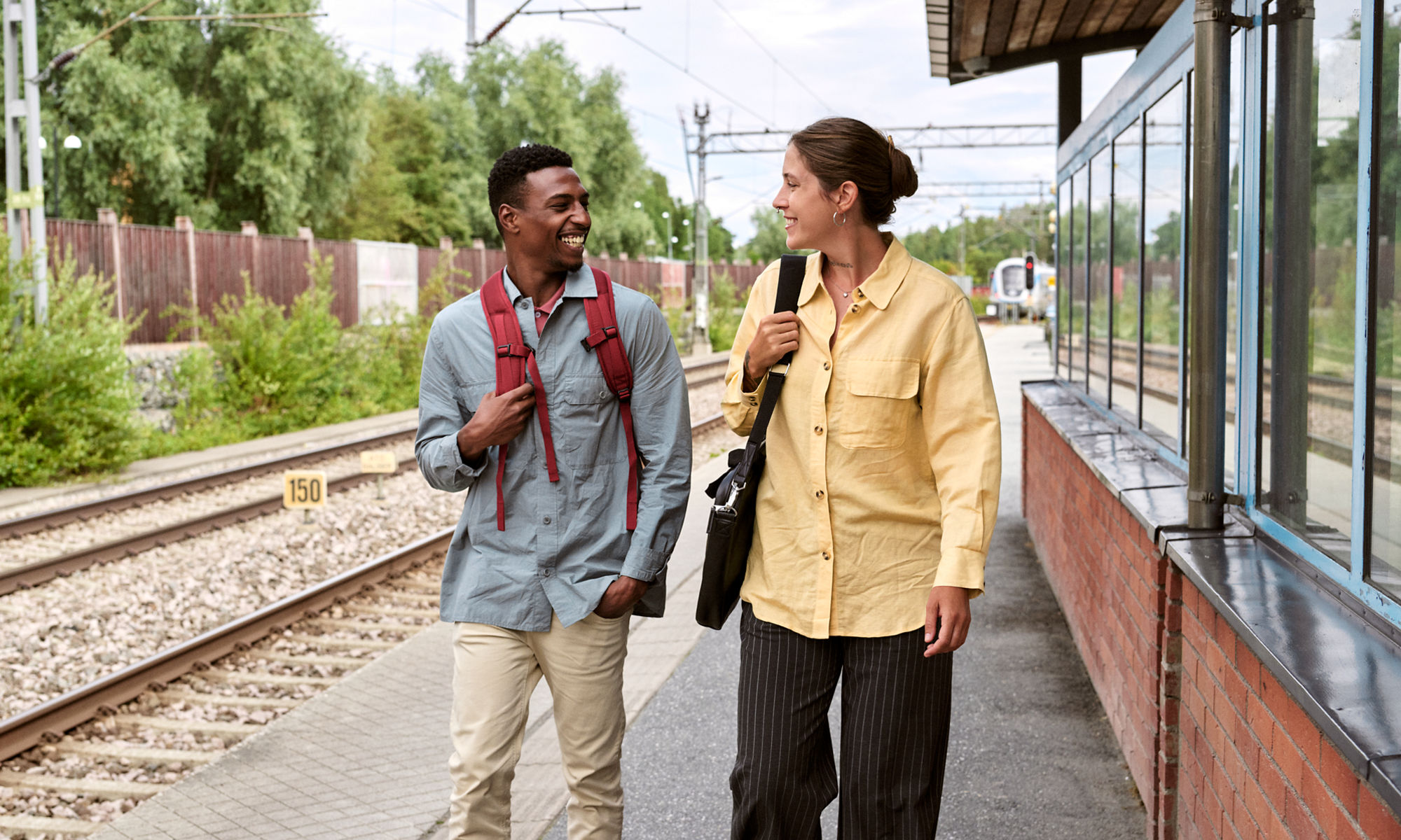 Man and woman on a train station