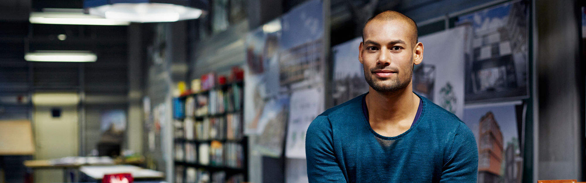 A young man in architect office