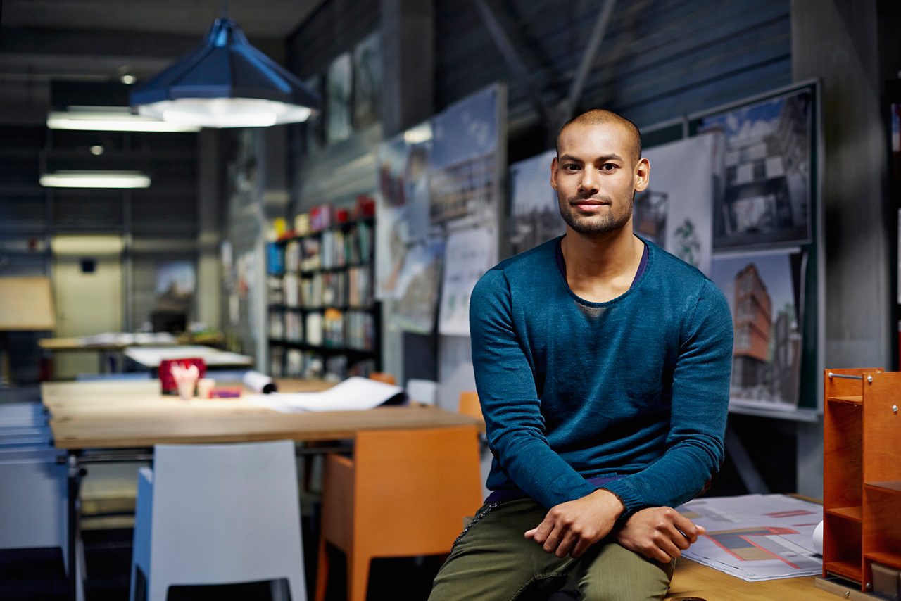 A young man in architect office