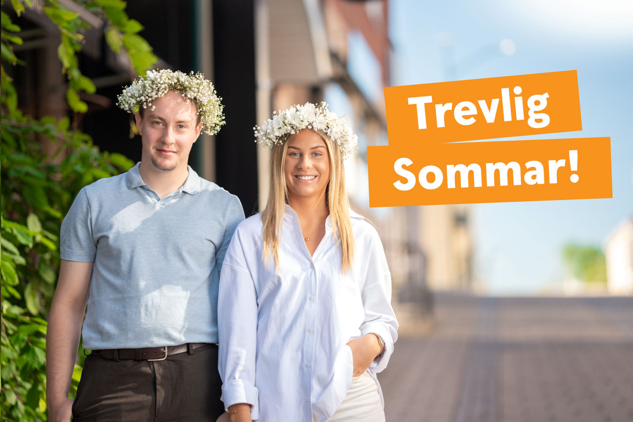 Elliot och Emma utanför bankens entré