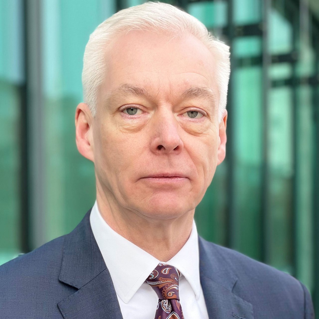 Senior businessman portrait in modern office district