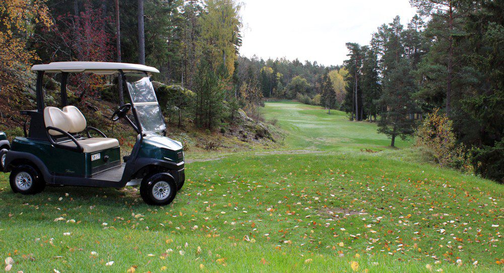 Golfbil på en golfbana