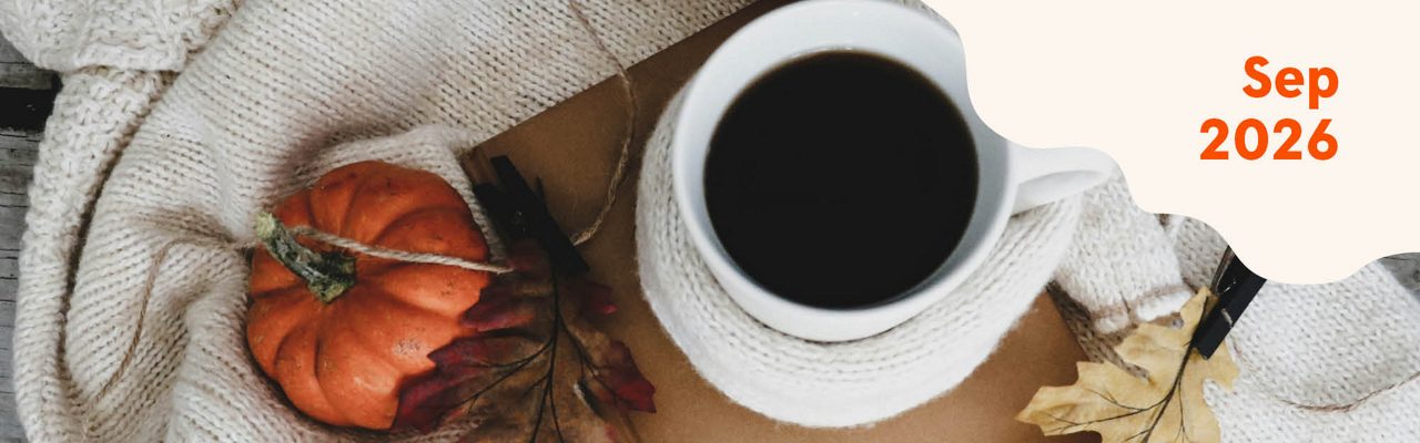 Ett foto på en kopp kaffe och en pumpa