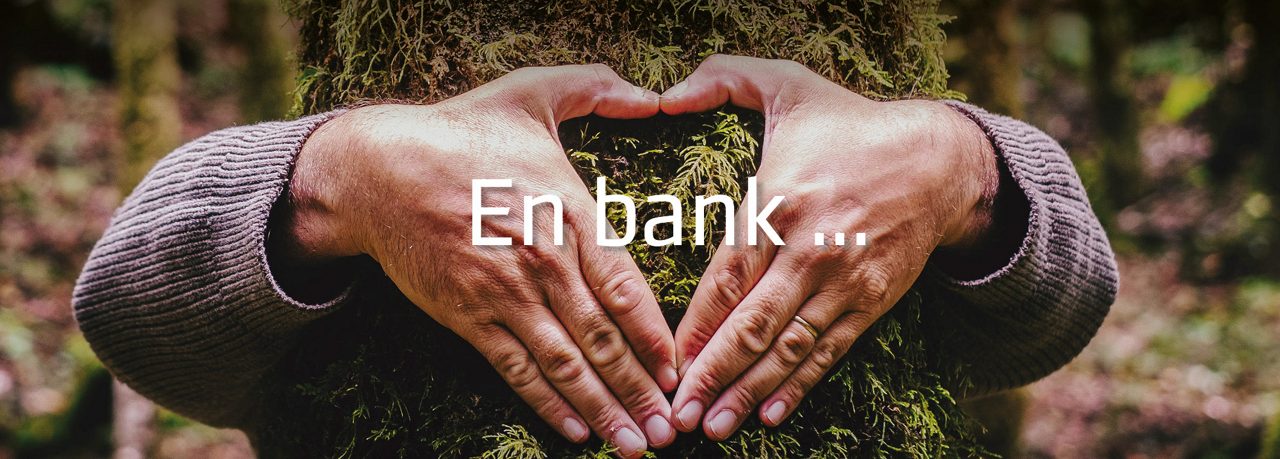 Händer kramar ett täd och med texten: En bank.... Fortsättning av meningen fortsätter nedan