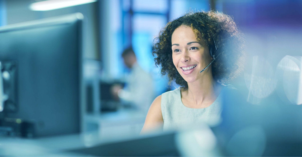 Customer Support & Contact Professional working the help desk
