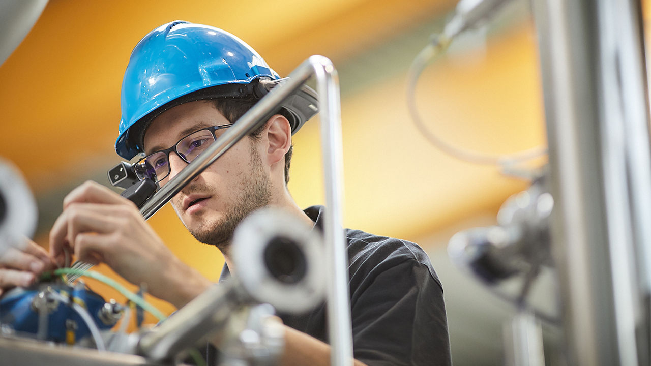 Technician working with smart glasses