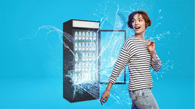  Surprised woman in front of fridge