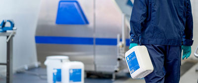 man walking with jug