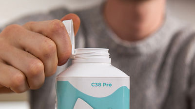 Tethered cap C38 on Tetra Top carton package