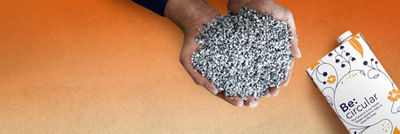 Carton package with hands holding polymers