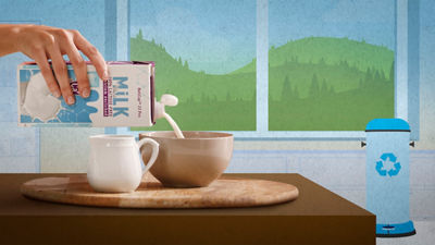 Woman pouring milk in bowl