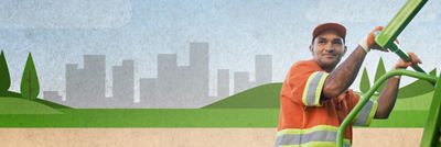 basurero delante de un camión de la basura