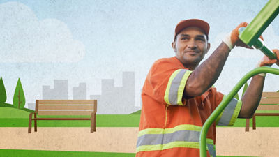 garbage man in front of garbage truck