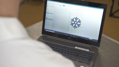 computer with a design software on the screen