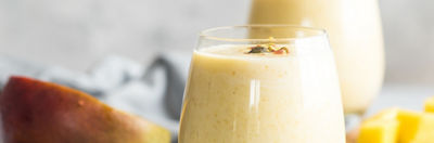 drinking yoghurt in a glass with mango
