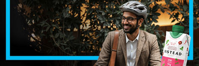 Man on bike and Tetra Prisma Aseptic carton