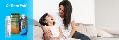 Mother and dauther with Tetra Pak