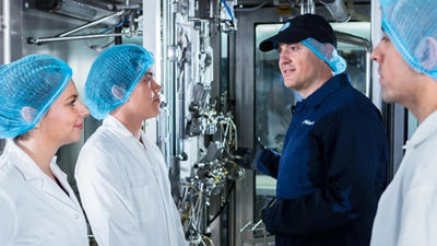 people listening at training machine 