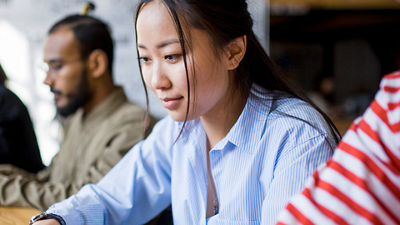 Woman focused working in an office