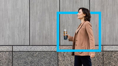 Woman walking, blue border