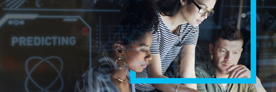 people looking in a computer