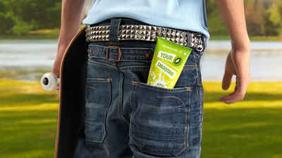 Boy with Tetra Wedge Aseptic carton in back pocket