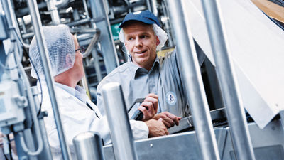 Two people in factory