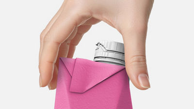 Close-up of Tetra Pak drink carton in hand