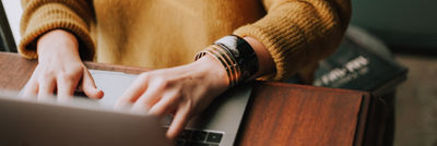Woman typing on laptop