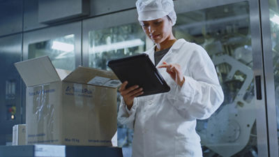 woman looking at machine