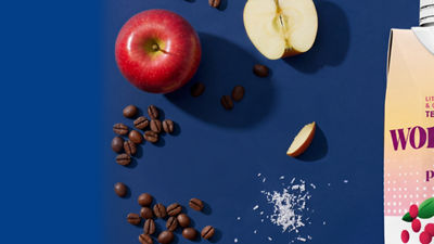 Apples, coffee beans and food supplement and nutrition drink.