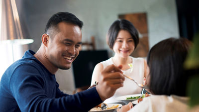 Asian family having dinner