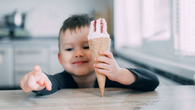 Boy holding ice cream