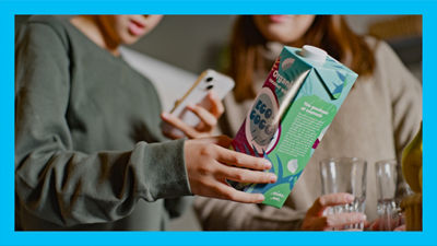 Boy scanning package