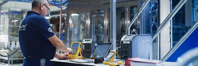 Service engineer with calibration instruments