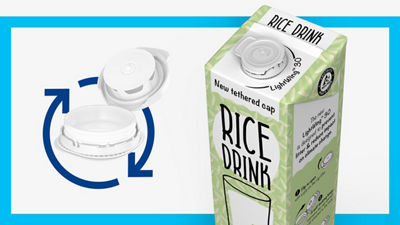 Carton with rice drink and teathered cap