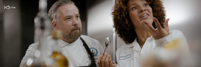 Chef and customer testing food at the Food development centre