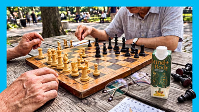 Chess board and chess players, nutrition drink in Tetra Prisma Aseptic carton
