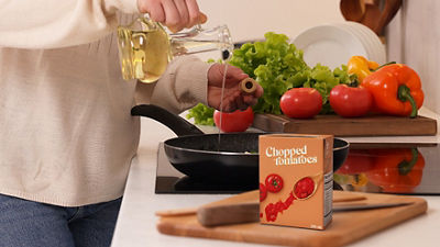 Chopped tomatoes in Tetra Recart carton package