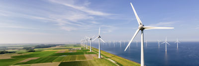 Windmills and the sun setting 