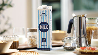 Breakfast table, white milk in Tetra Pak carton package