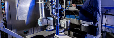 Cobot and operator at plant